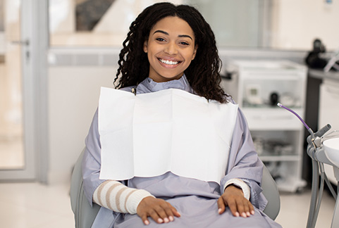 Female patient smiling in dental chair