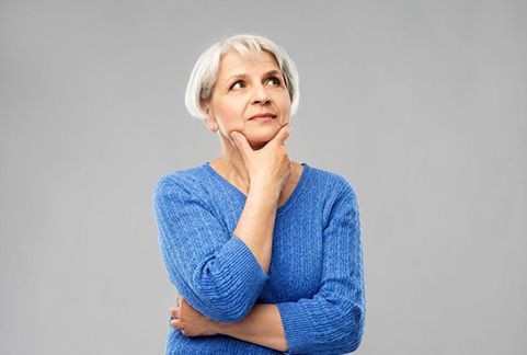 Senior woman posing in a thinking position