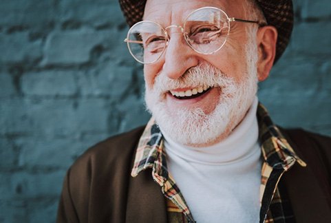 Senior man looking dapper and smiling