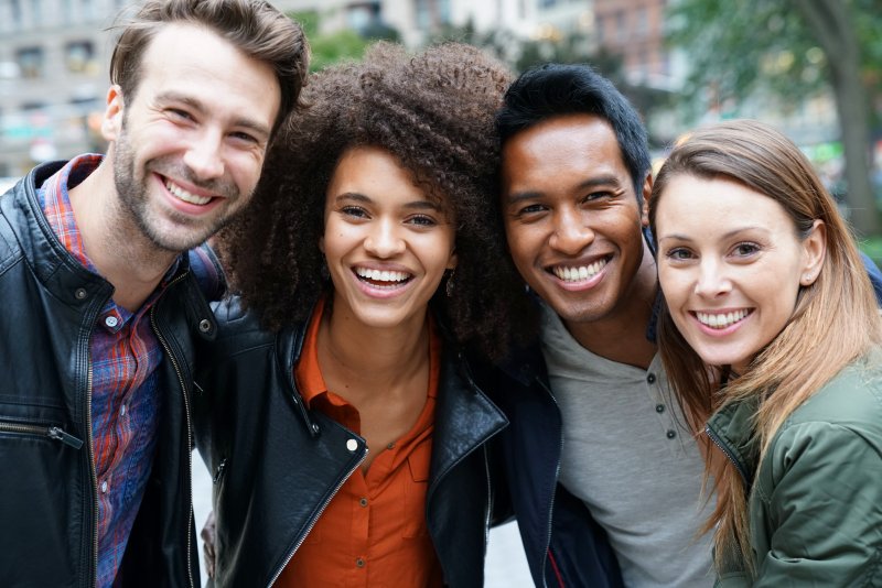 Multiethnic friends smiling in New York